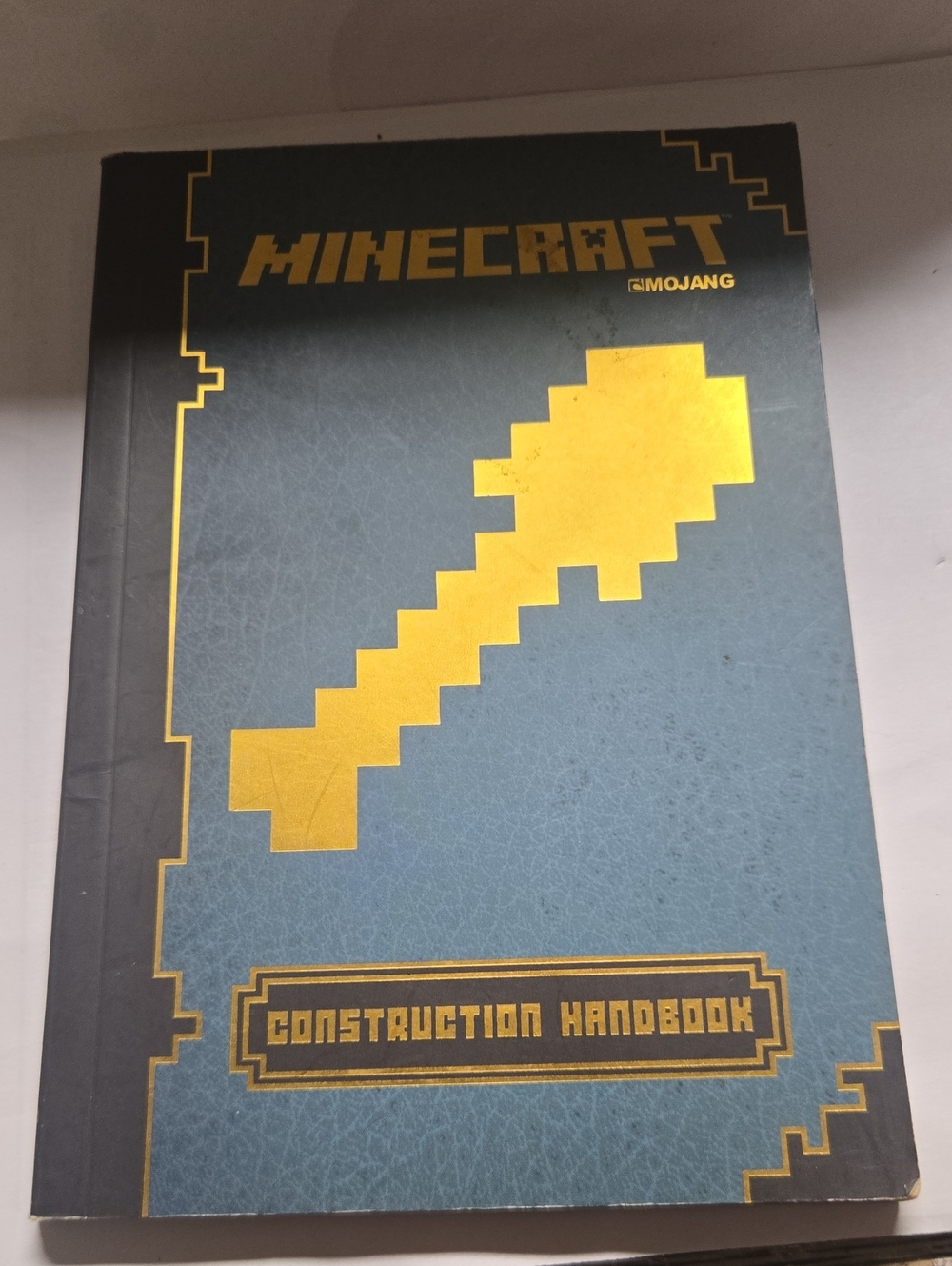 Scholastic Minecraft Construction Handbook - Blue and Gold Cover
